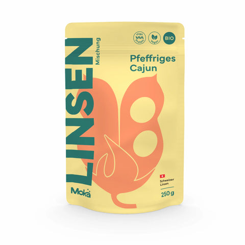 Mokä Pfeffriges Cajun Linsenmischung – Bio-Packung 250g, proteinreich & vegan. Vorderseite mit Logo, Produktdesign und Hauptzutaten.