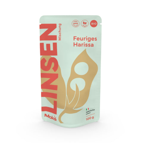 Mokä Feuriges Harissa Linsenmischung – Bio-Packung 100g, proteinreich und vegan. Frontalansicht zeigt Verpackungsform und Design.